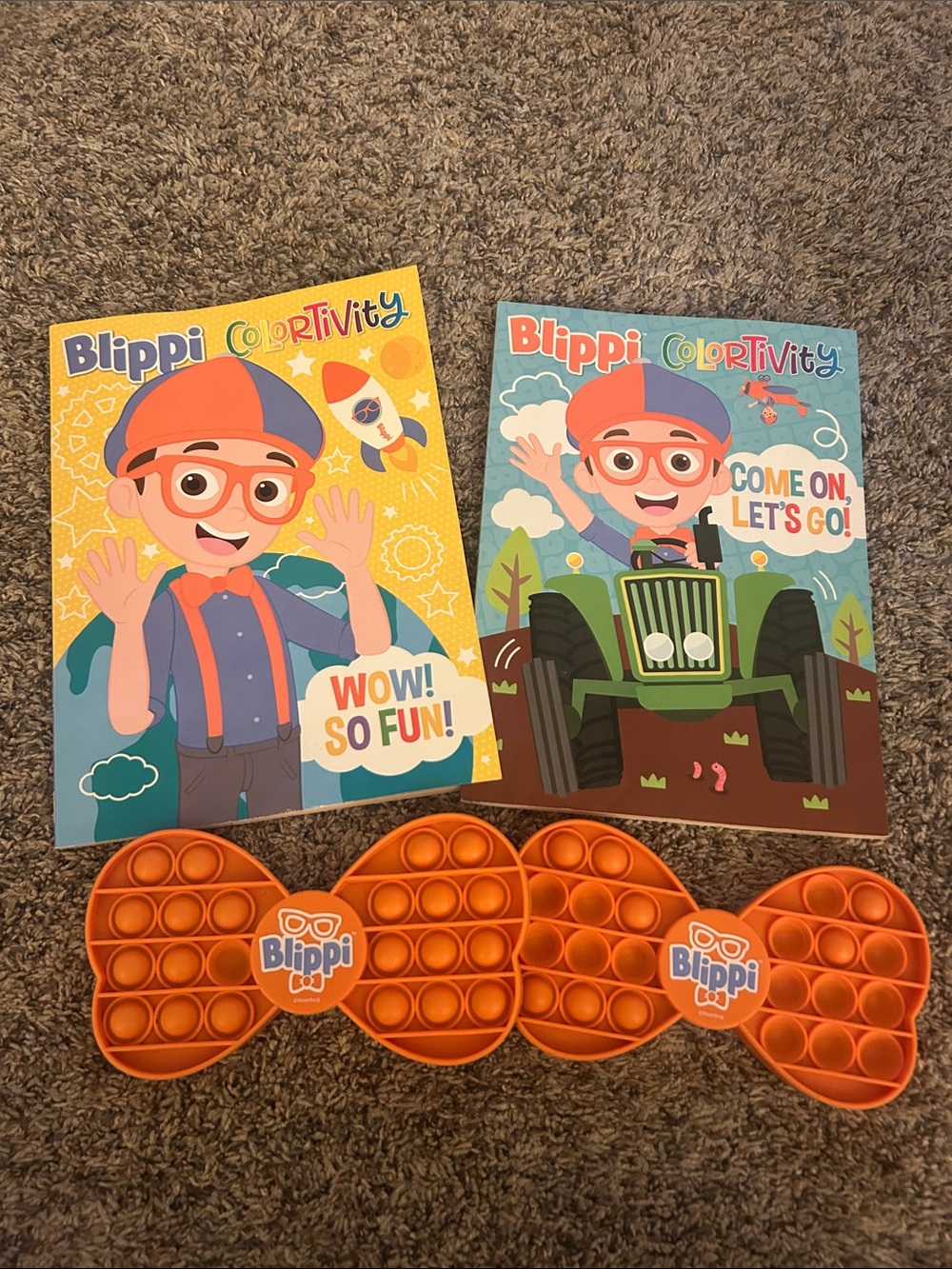 Blippi coloring books and pop it’s